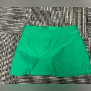 Women’s green Nike SKORT large with shorts underneath sea measurements